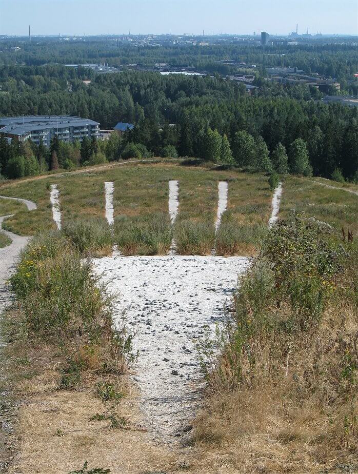 The unique "Tree Mountain" (Puuvuori) land art installation in Ylöjärvi, Finland, a hidden gem for eco-conscious travelers and photography enthusiasts.